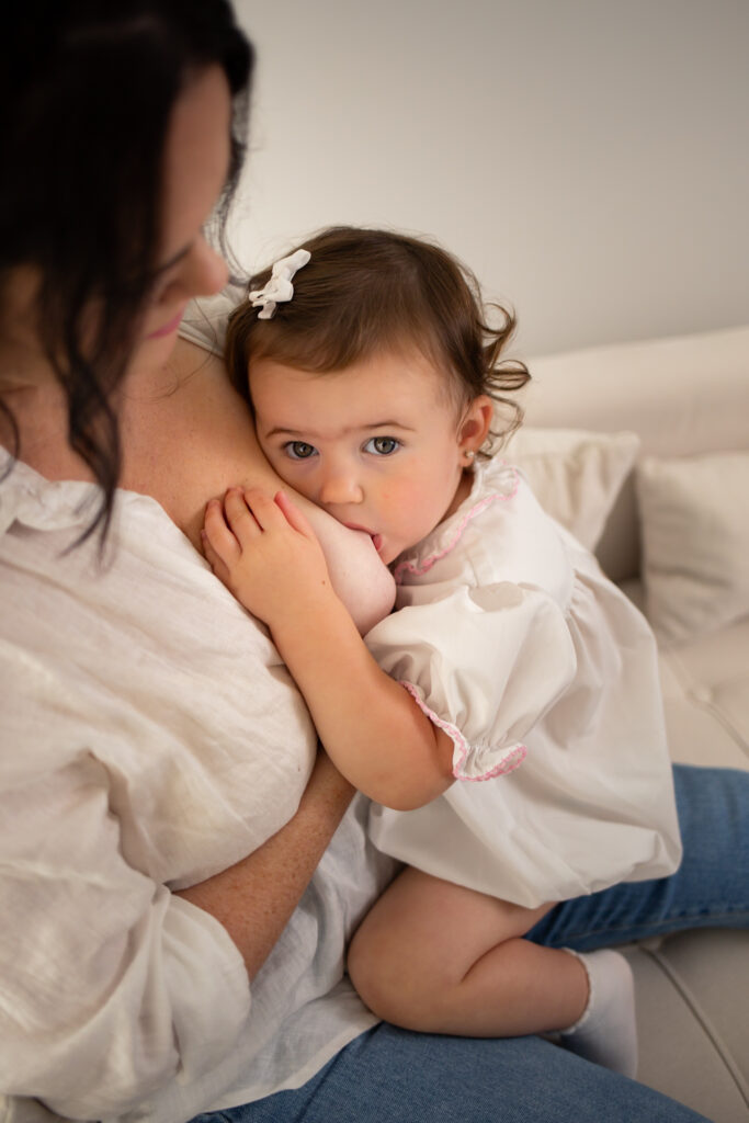 baby toddler girl breastfeeding 
